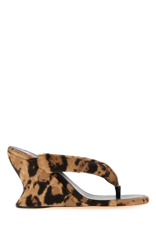 Balenciaga Wedg Exterior: 100% Calf Hair; Interior: 100% Leather; Sole: Leather mule heel in brown
