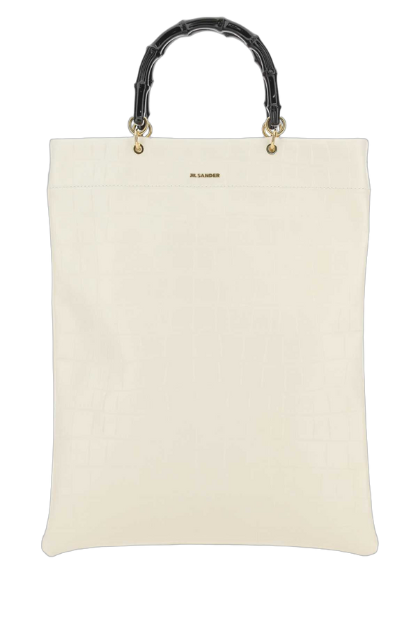Jil Sander Exterior: 100% Leather; Finishing: Golden metal top handle bag in beige