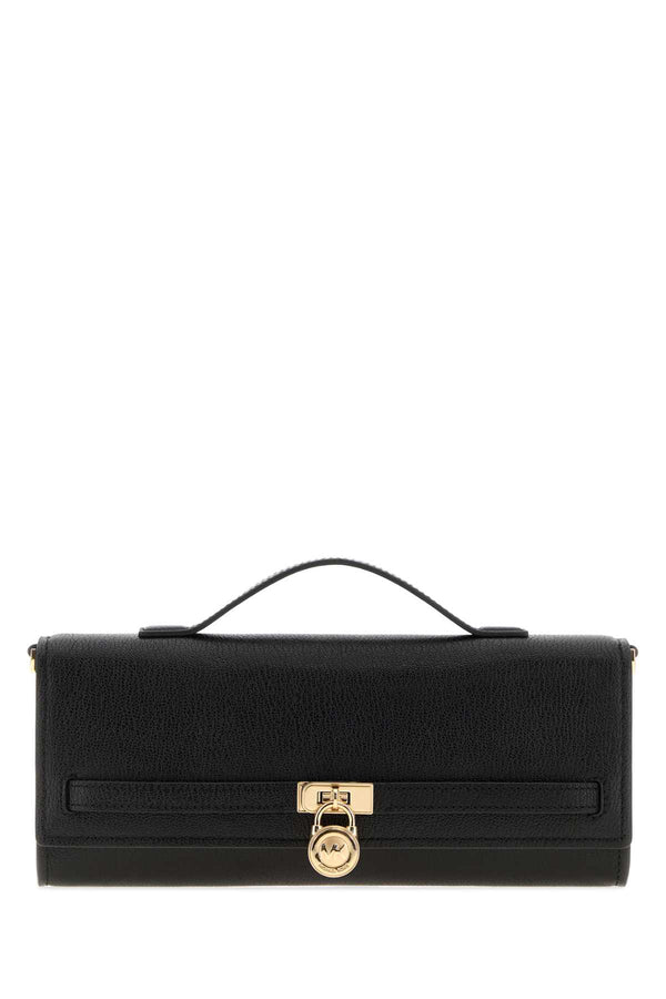 Michael By Michael Kors Clutch Exterior: 100% Leather clutch in black