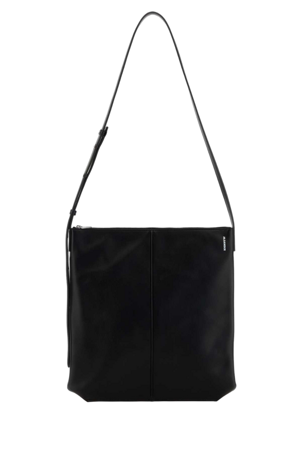Jil Sander Exterior: 100% Calf. Lining: 100% Nappa leather. Finishing: Silver metal shoulder bag in black