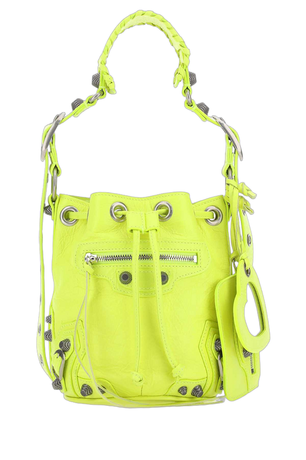 Balenciaga Exterior: 100% Lamb Lining: 100% Fabric Finishing: Antiqued silver metal bucket bag in yellow