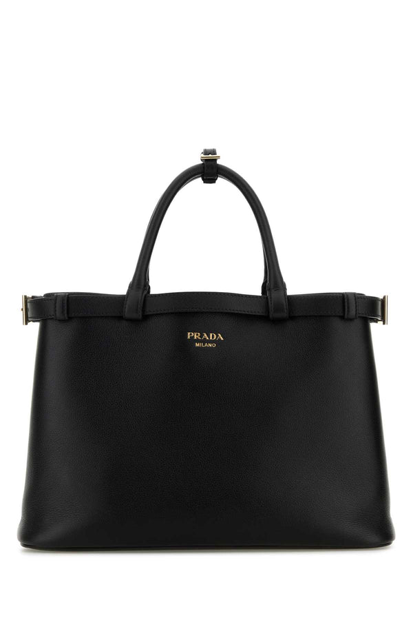 Prada Exterior: 100% Leather; Lining: 100% Nappa leather top handle bag in black