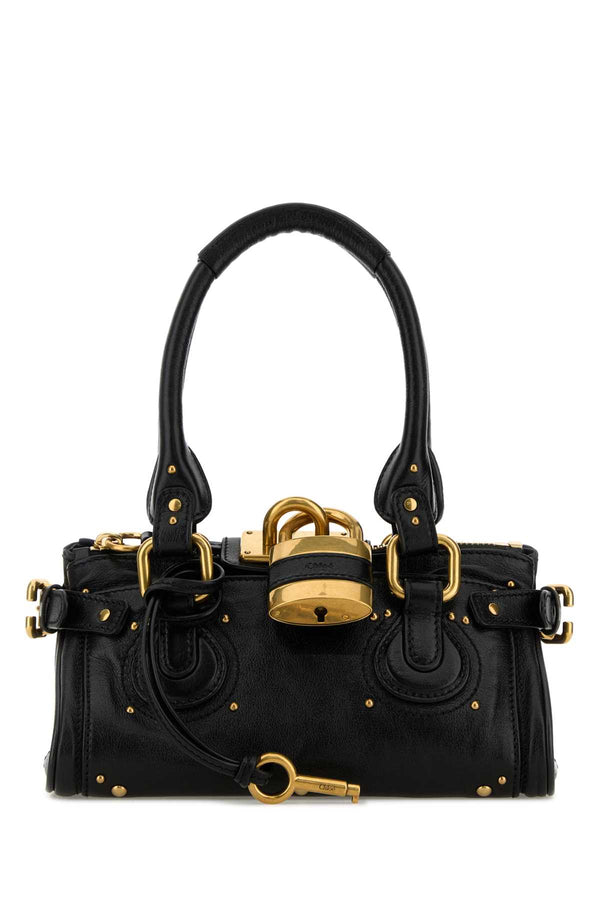 Chloé Exterior: 100% Bovine leather top handle bag in black