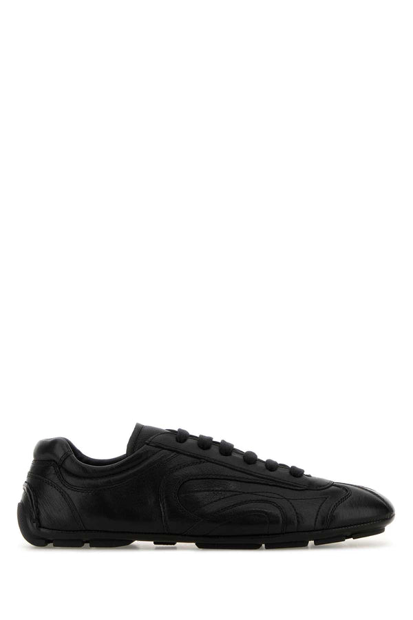Prada Exterior: 100% Nappa leather; Interior: 100% Leather; Sole: Rubber sneakers in black