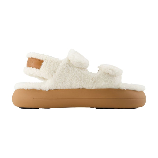 Moon Boot lambskin slipper in white