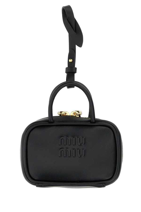 Miu Miu Exterior: 100% Leather; Lining: 100% Fabric; Finishing: Golden metal wallet in black