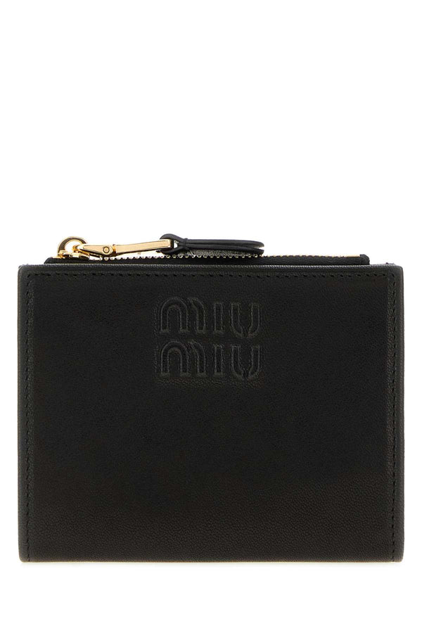 Miu Miu Exterior: 100% Nappa leather; Finishing: Golden metal wallet in black