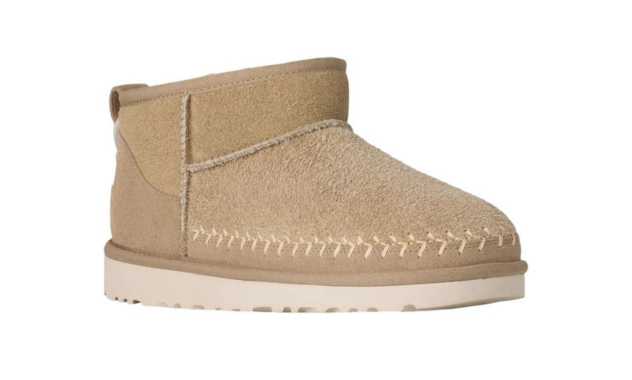 UGG 100% Suede upper; 100% Shearling lining; Synthetic outsole boot in beige