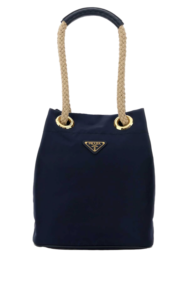 Prada Exterior: 100% Fabric; Interior: 100% Fabric; Finishing: Golden metal bucket bag in navy