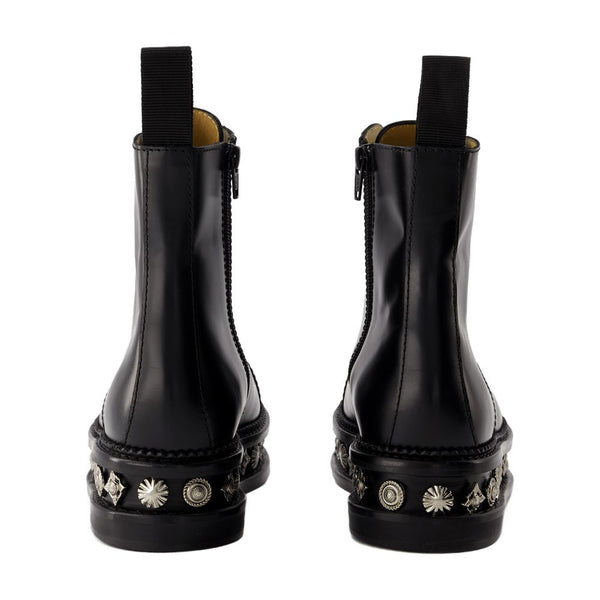 Toga Pulla leather boots in black