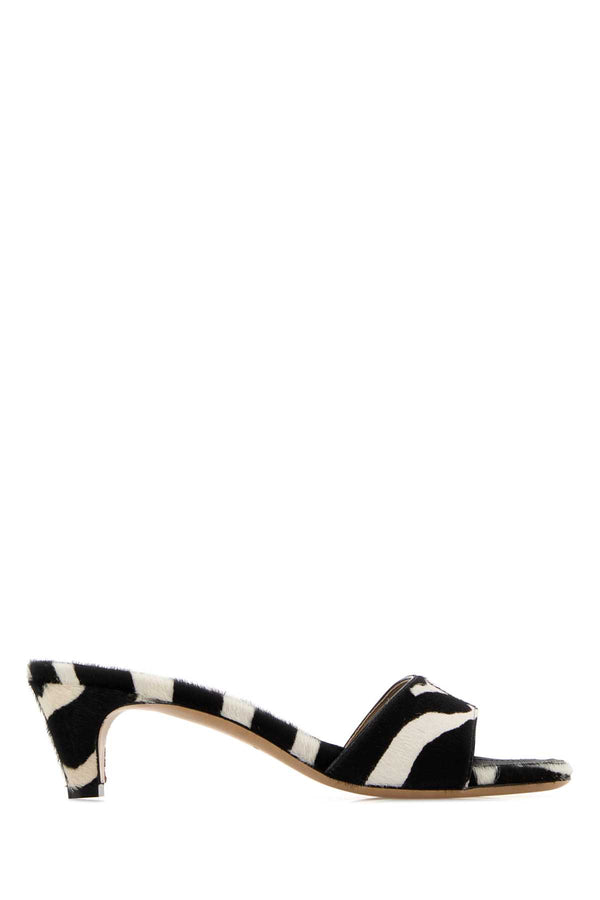 Ferragamo Exterior: 100% Leather; Interior: 100% Leather; Sole: Leather mule in black