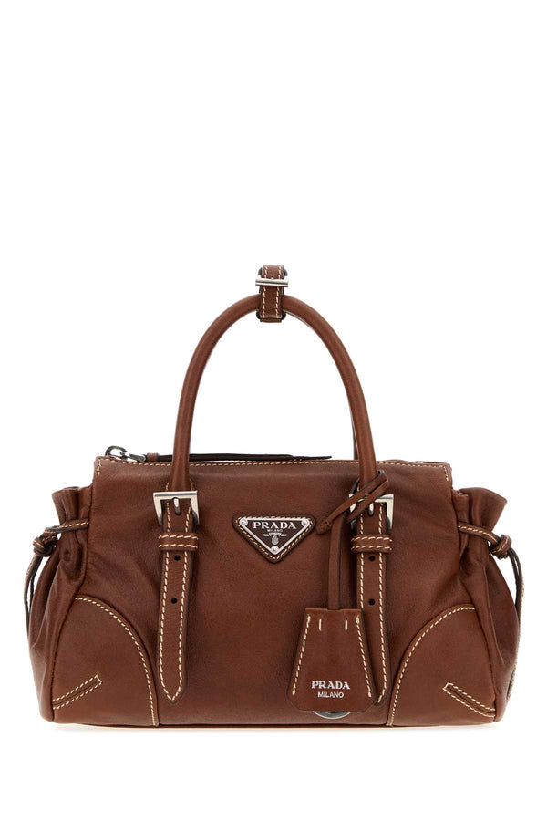 Prada 100% Calf Leather (Exterior) top handle bag in brown