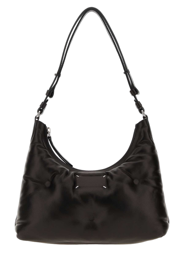 Maison Margiela Exterior: 100% Ovine leather; Lining: 100% Polyester; Finishing: Silver metal shoulder bag in black