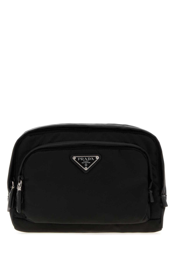 Prada Exterior: 100% Fabric Finishing: Silver metal beauty case in black