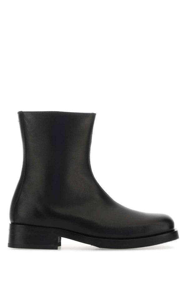 Our Legacy Exterior: 100% Calf. Interior: 100% Leather. Sole: Rubber ankle boot in black