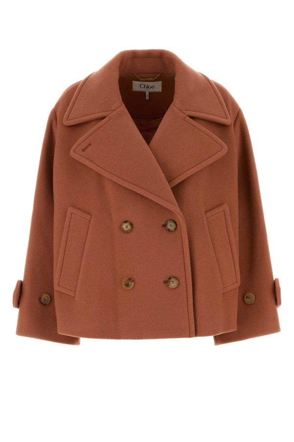 Chloé Exterior: 80% Virgin wool 20% Nylon; Lining: 62% Viscose 38% Cotton coat in pink