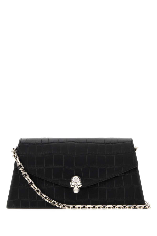 Alexander McQueen Exterior: 100% Calf Lining: 100% Leather Finishing: Silver metal crossbody bag in black