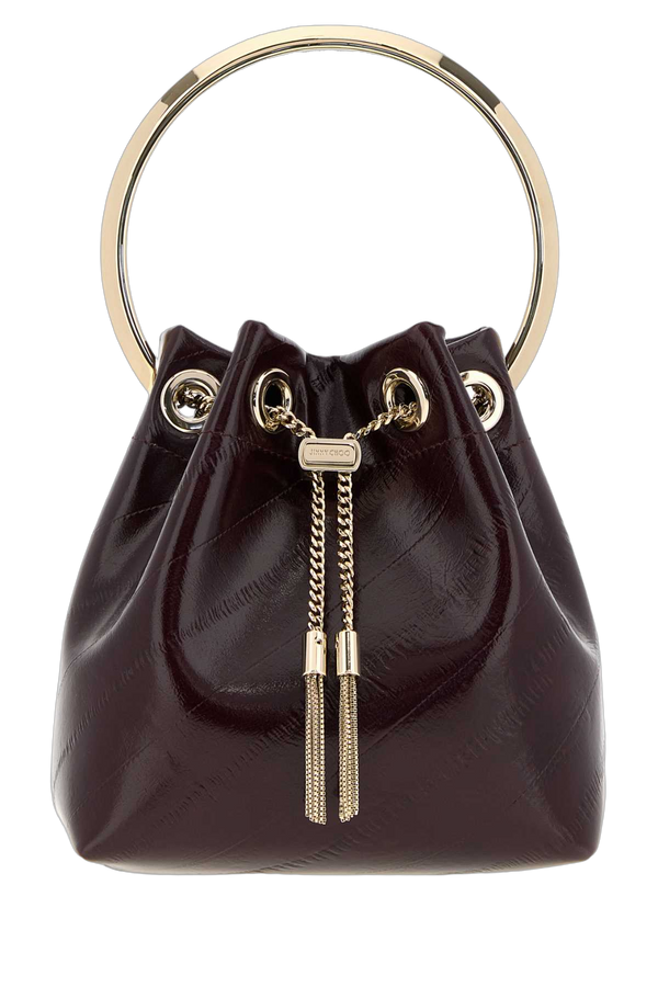 Jimmy Choo Exterior: 100% Leather; Lining: 100% Suede; Finishing: Golden metal bucket bag in purple