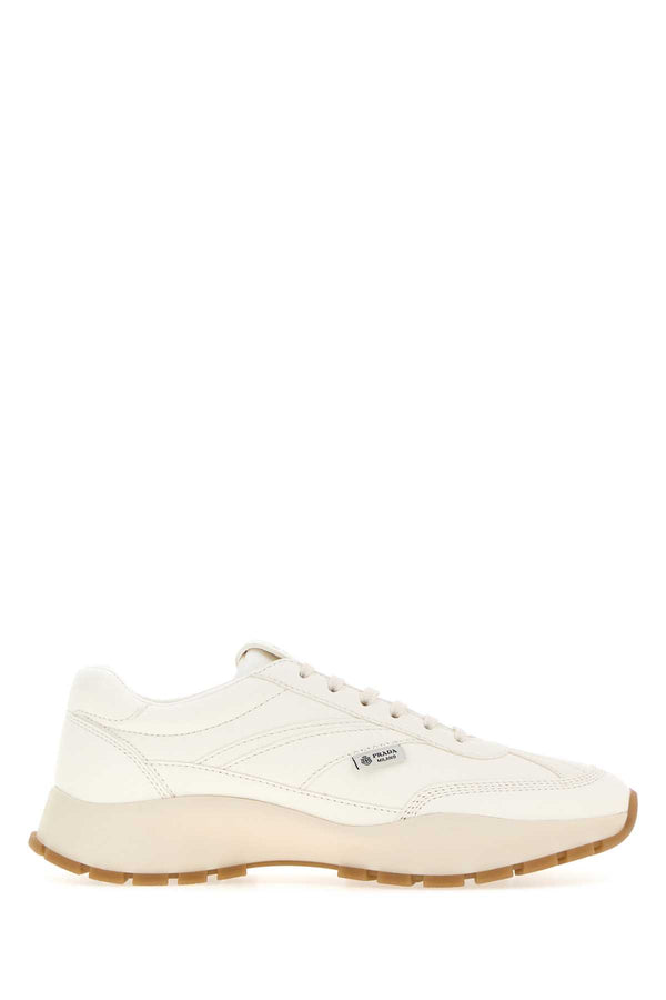 Prada Exterior: 100% Leather; Interior: 100% Fabric; Sole: Rubber sneaker in white