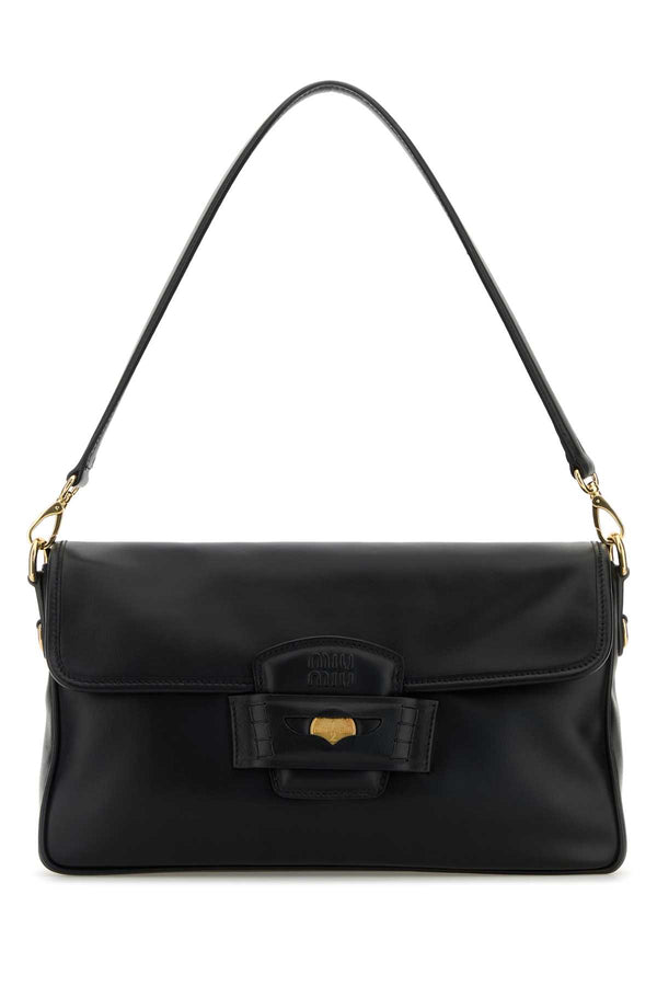 Miu Miu Exterior: 100% Calf shoulder bag in black