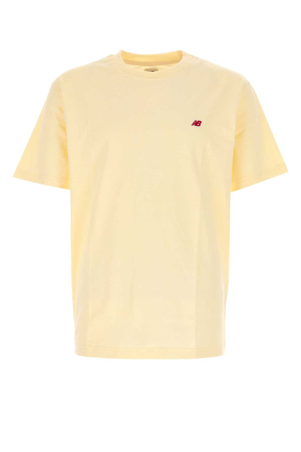 New Balance Core 100% Cotton t-shirt in yellow