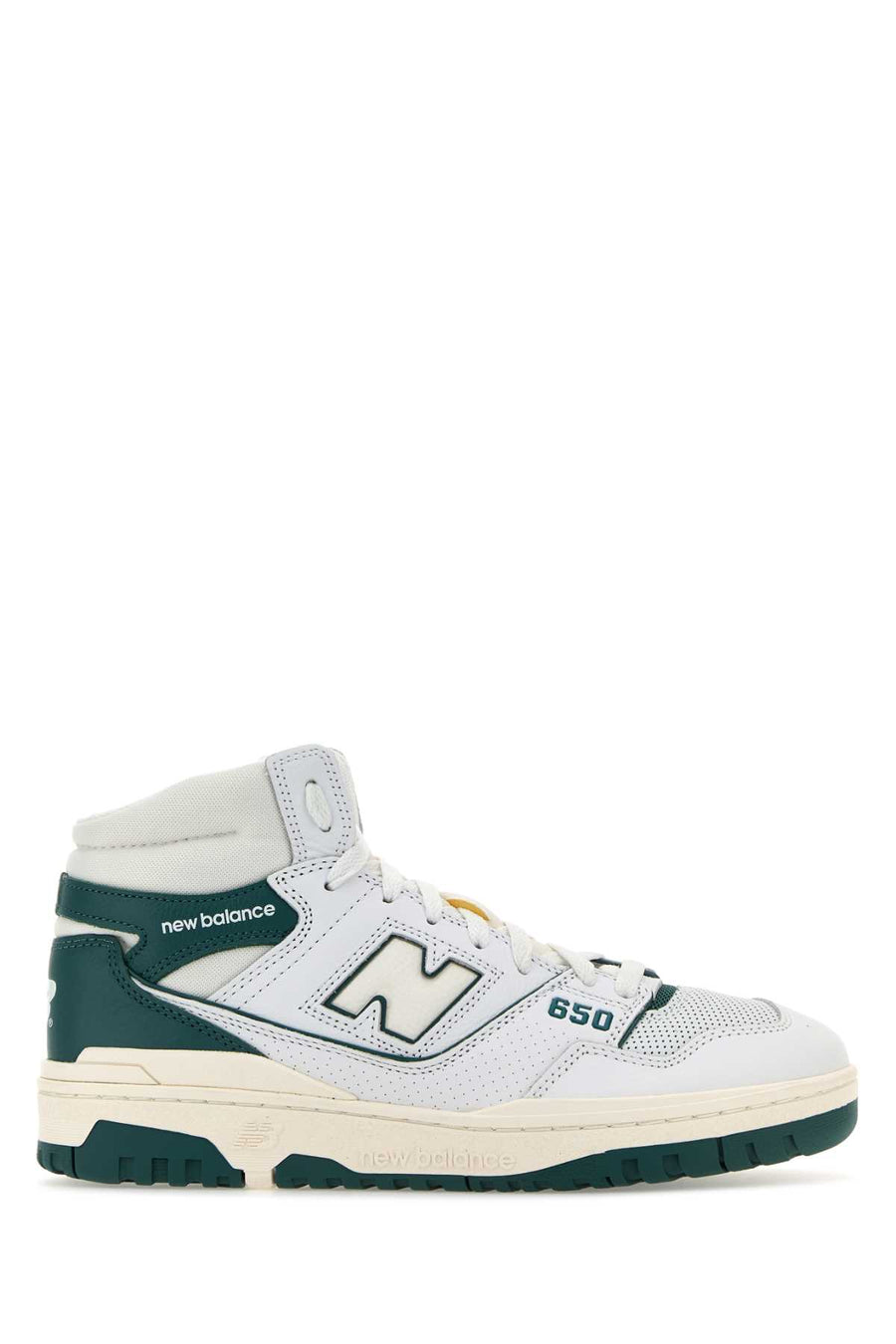 New Balance Exterior: 100% Leather; Interior: 100% Fabric; Sole: Rubber sneaker in white