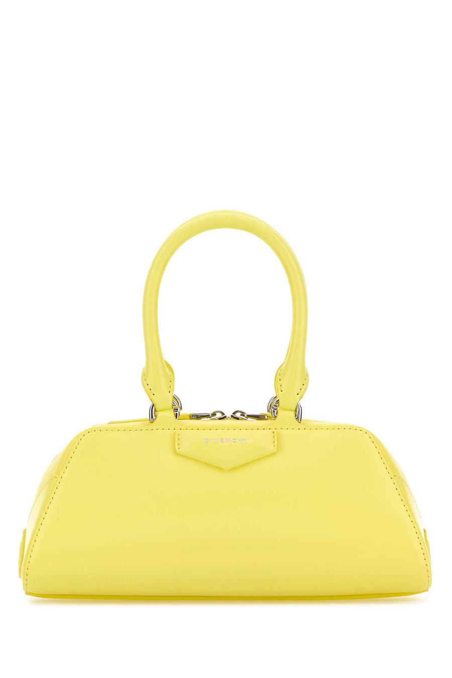 Givenchy East Exterior: 100% Calf Lining: 90% Cotton 10% Polyester Finishing: Silver metal top handle bag in yellow