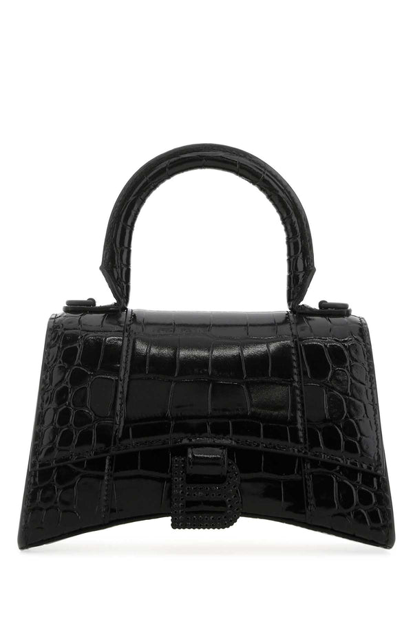 Balenciaga Exterior: 100% Calf Lining: 100% Leather Finishing: Enamelled metal top handle bag in black
