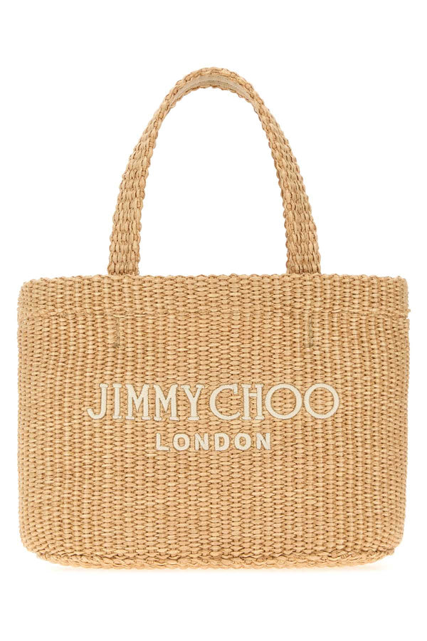 Jimmy Choo Exterior: 100% Raffia; Finishing: Platinum tote bag in beige