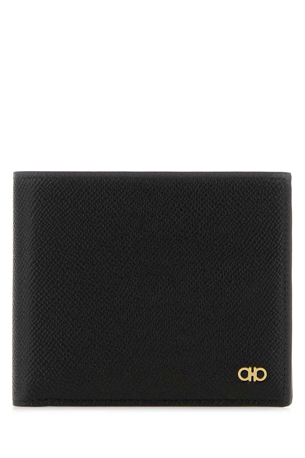 Ferragamo Gancio Exterior: 100% Calf; Finishing: Golden metal wallet in black