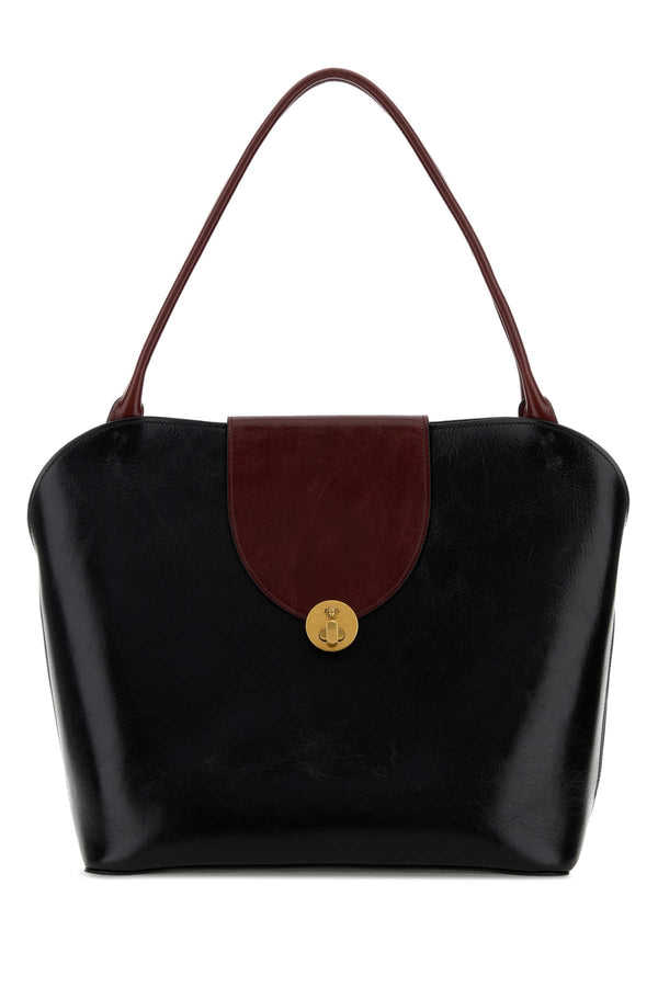 Versace Exterior: 100% Calf Lining: 100% Leather Finishing: Golden metal shoulder bag in black