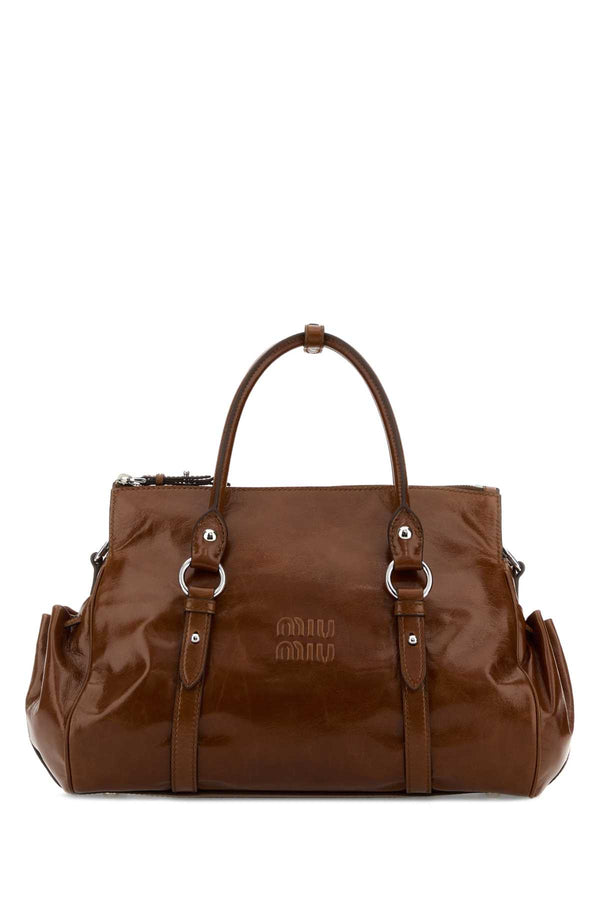 Miu Miu Exterior: 100% Calf shoulder bag in brown