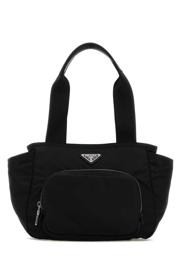 Prada Exterior: 100% Fabric; Lining: 100% Fabric; Finishing: Silver metal shoulder bag in black