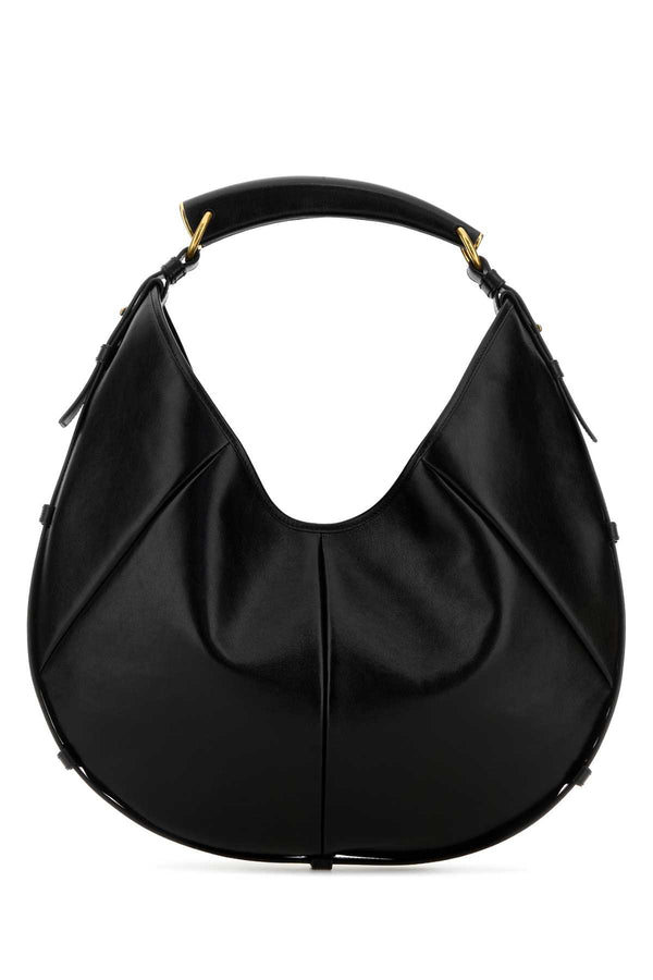 Saint Laurent Mombasa Exterior: 100% Calf; Lining: 100% Suede; Finishing: Antiqued golden metal shoulder bag in black