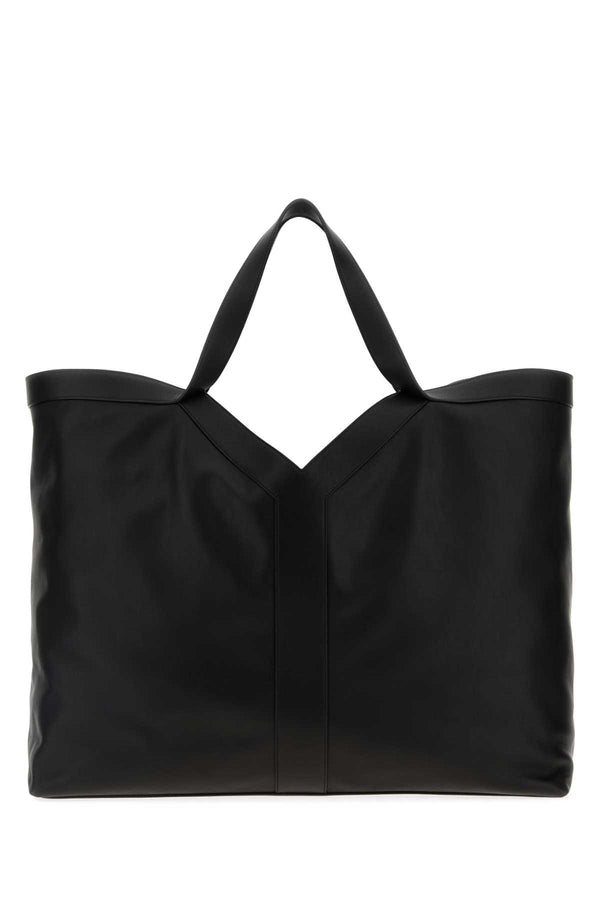 Saint Laurent Tote Exterior: 100% Calf tote bag in black
