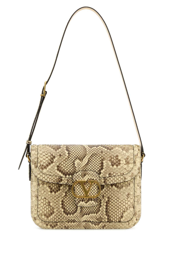 Valentino Garavani Exterior: 100% Leather; Lining: 100% Nappa leather; Finishing: Golden metal shoulder bag in beige