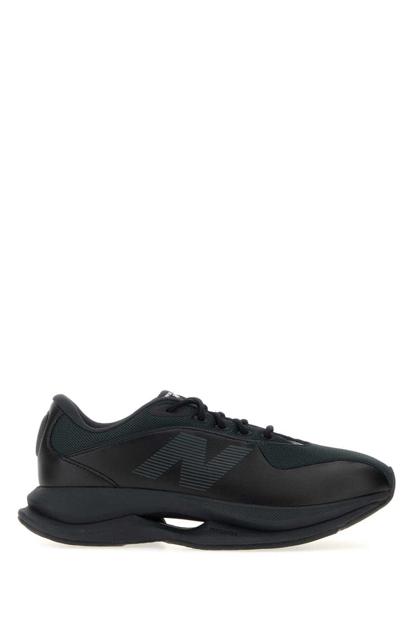 Junya Watanabe Leather Exterior: Mesh and Synthetic Leather; Interior: Fabric; Sole: Rubber sneaker in black