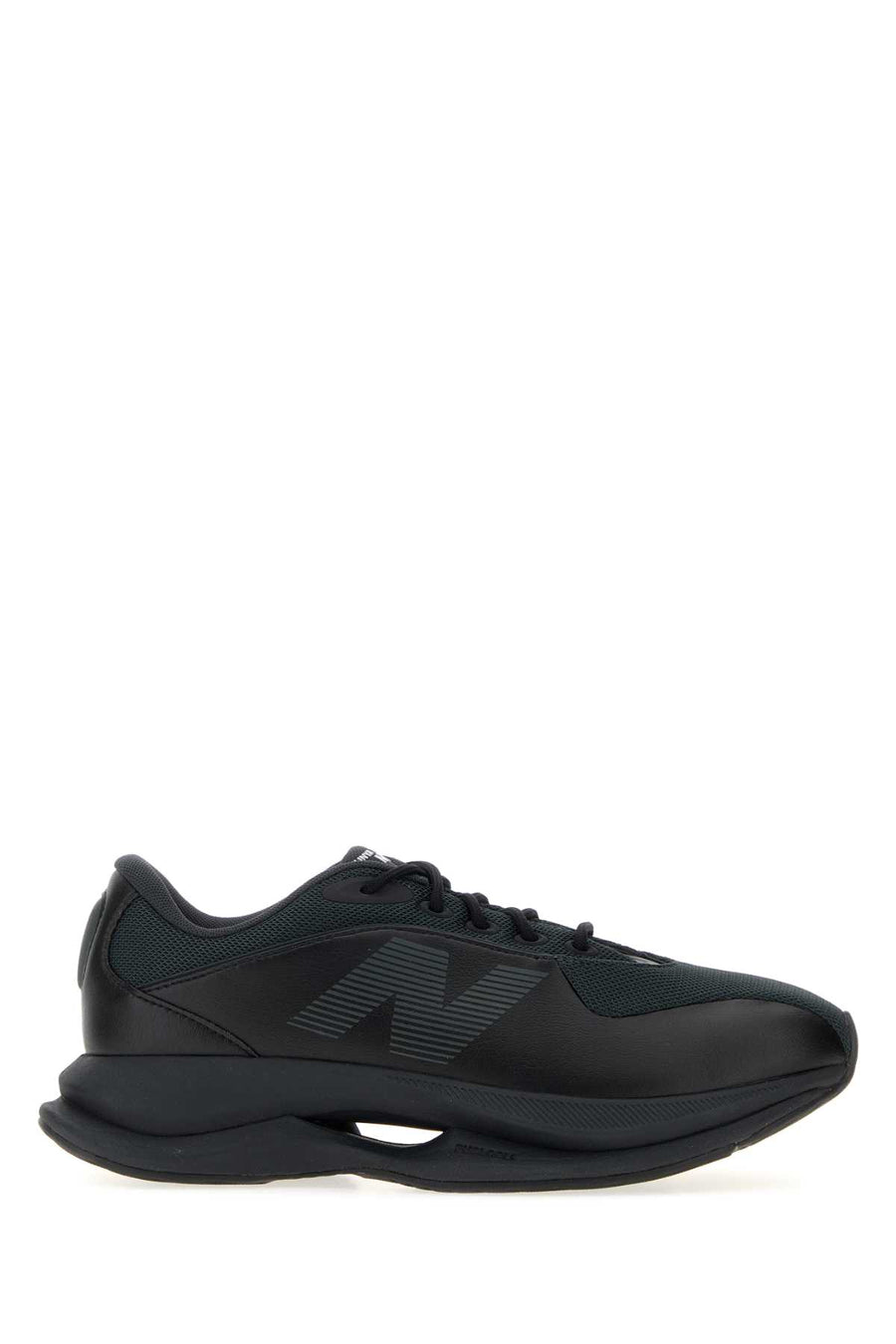 Junya Watanabe Leather Exterior: Mesh and Synthetic Leather; Interior: Fabric; Sole: Rubber sneaker in black