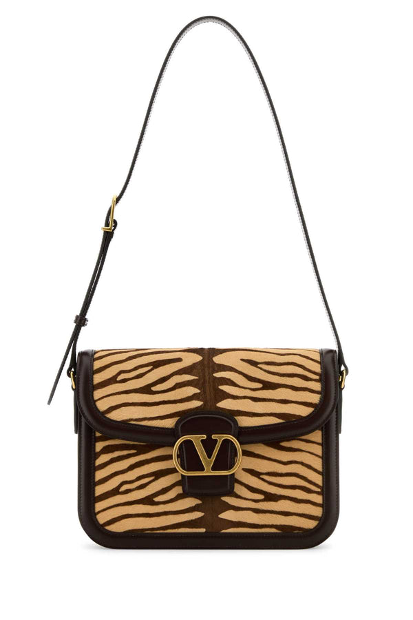 Valentino Garavani Exterior: 100% Calf hair shoulder bag in beige
