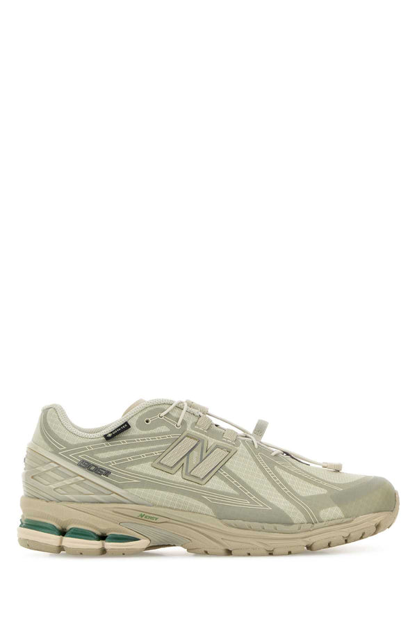 New Balance Exterior: Mesh and Fabric; Interior: Fabric; Sole: Rubber sneaker in green