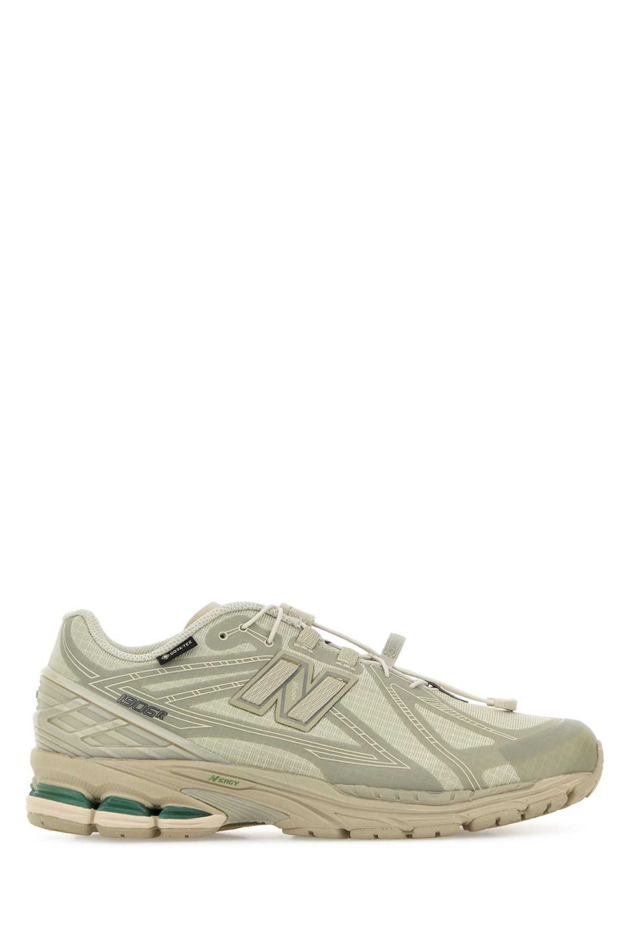 New Balance Exterior: Mesh and Fabric; Interior: Fabric; Sole: Rubber sneaker in green