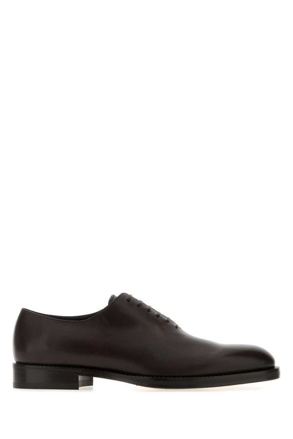 Ferragamo Exterior: 100% Calf; Interior: 100% Leather; Sole: Leather oxford in brown