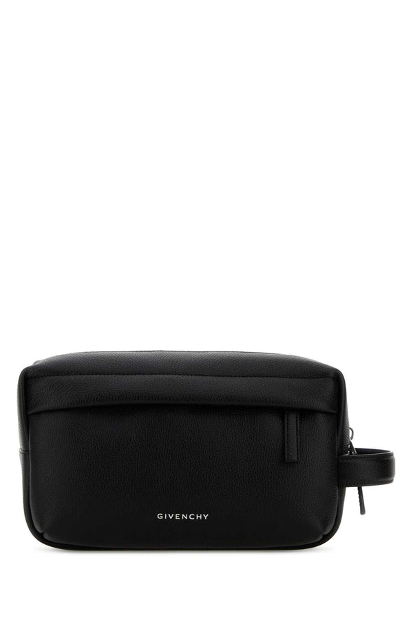 Givenchy Toilet Exterior: 100% Calf Lining: 100% Nylon Finishing: Silver metal travel wallet in black