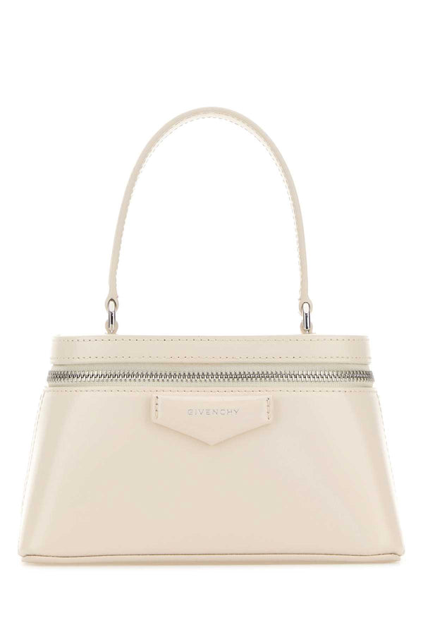 Givenchy Exterior: 100% Calf top handle bag in beige