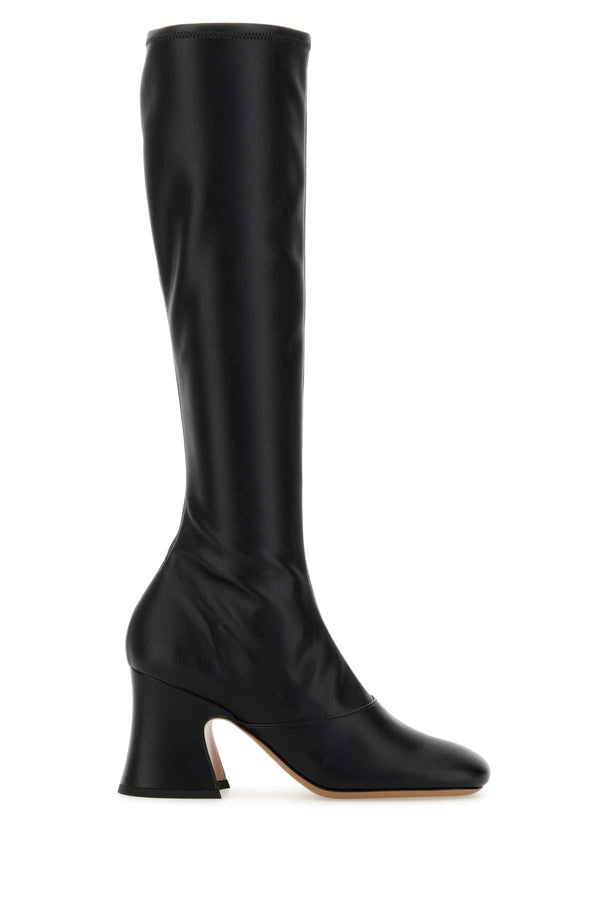 Chloé Janis 55% Polyurethane 45% Polyester (upper and heel); 100% Leather domestic lamb lining; 100% Leather domestic cow outer sole boots in black