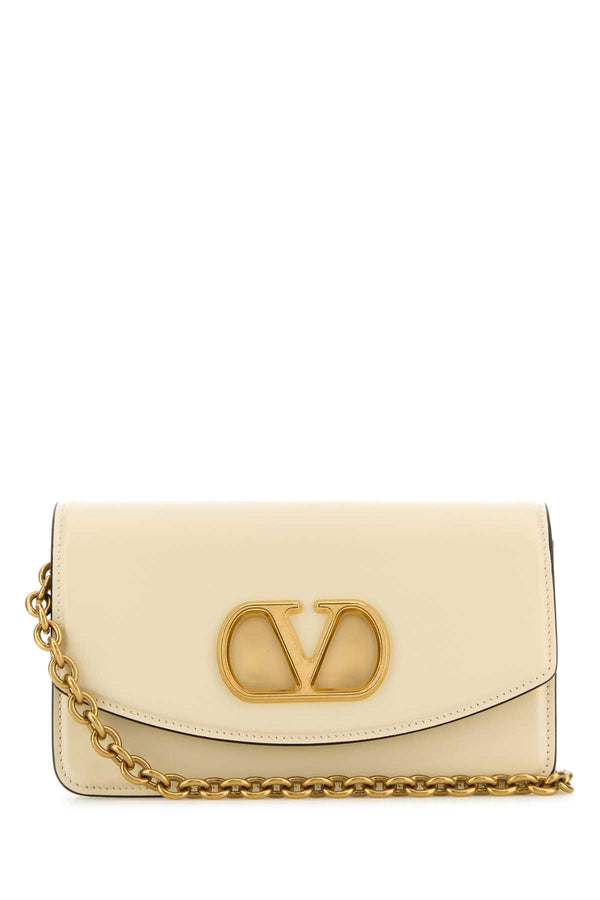 Valentino Garavani Clutch Exterior: 100% Leather; Lining: 100% Leather; Finishing: Antiqued golden metal shoulder bag in beige
