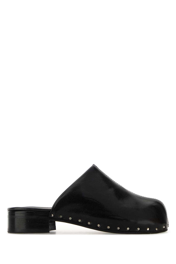 Our Legacy Exterior: 100% Bovine leather; Interior: 100% Leather; Sole: Rubber mule in black