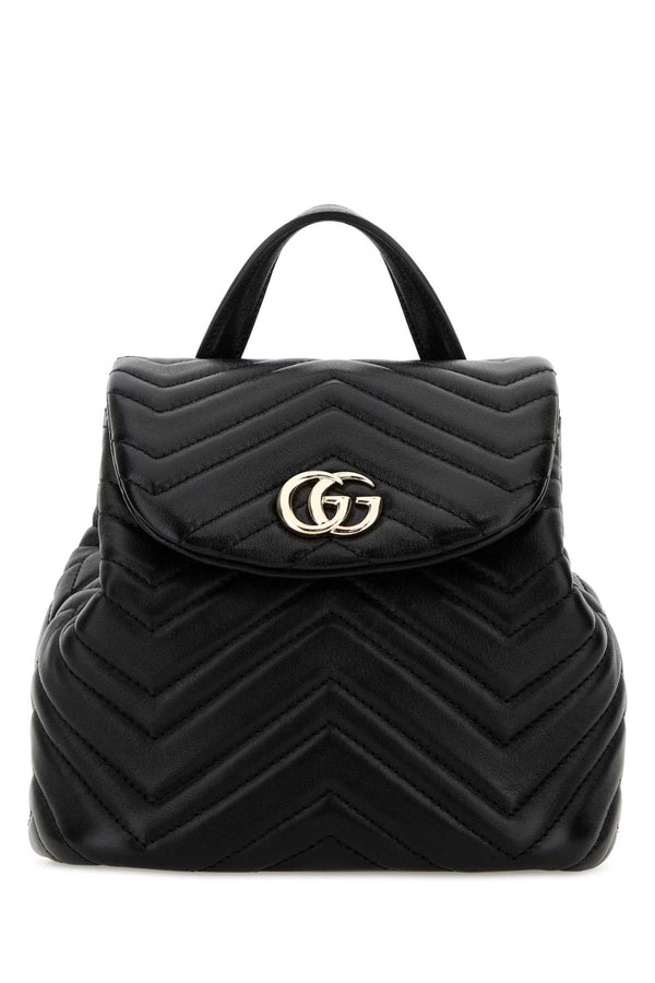 Gucci Exterior: 100% Nappa leather; Lining: 100% Fabric top handle bag in black