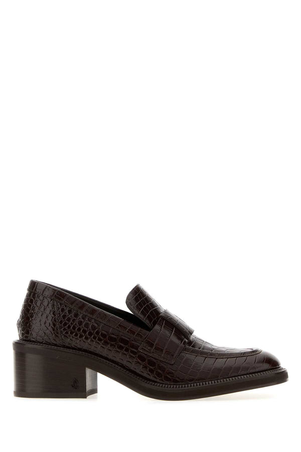 Jimmy Choo Exterior: 100% Leather pump in chocolate