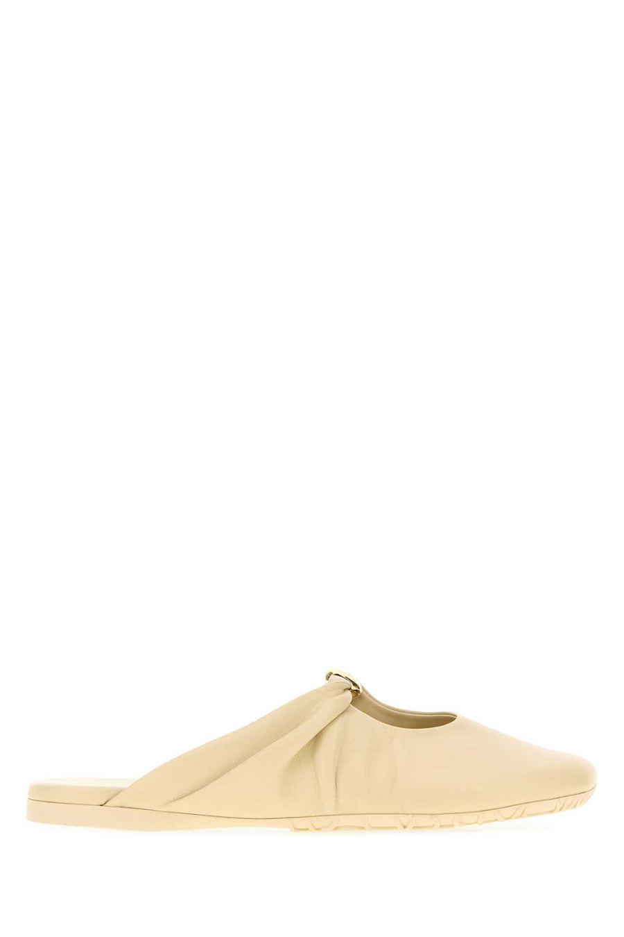 Loewe Soft Exterior: 100% Lamb; Interior: 100% Leather; Sole: Rubber mule in beige